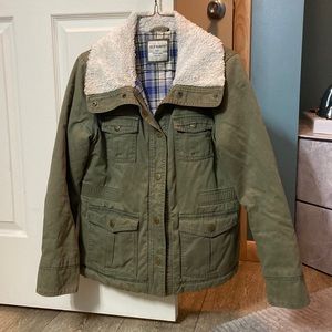 Old navy jacket. Flannel on the inside! Front deep pockets. Snap buttons